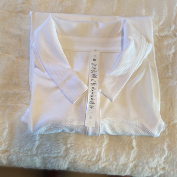 Lululemon short sleeve Polo Top, Size 12 NWT - Picture 9 of 9
